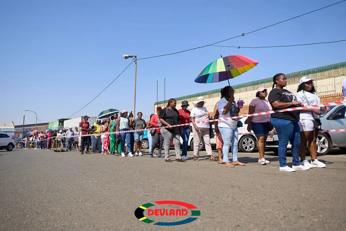 A queue at a Devland store