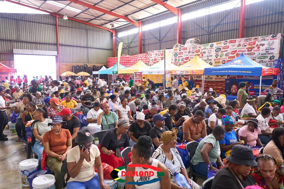 Buyers inside a Devland warehouse